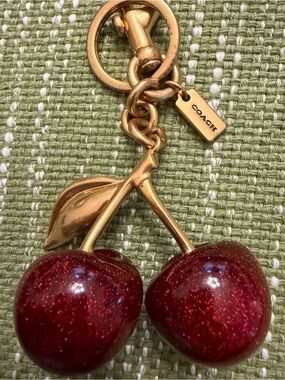Coach Gold-Tone Red Glitter Cherry Charm Bracelet Accent